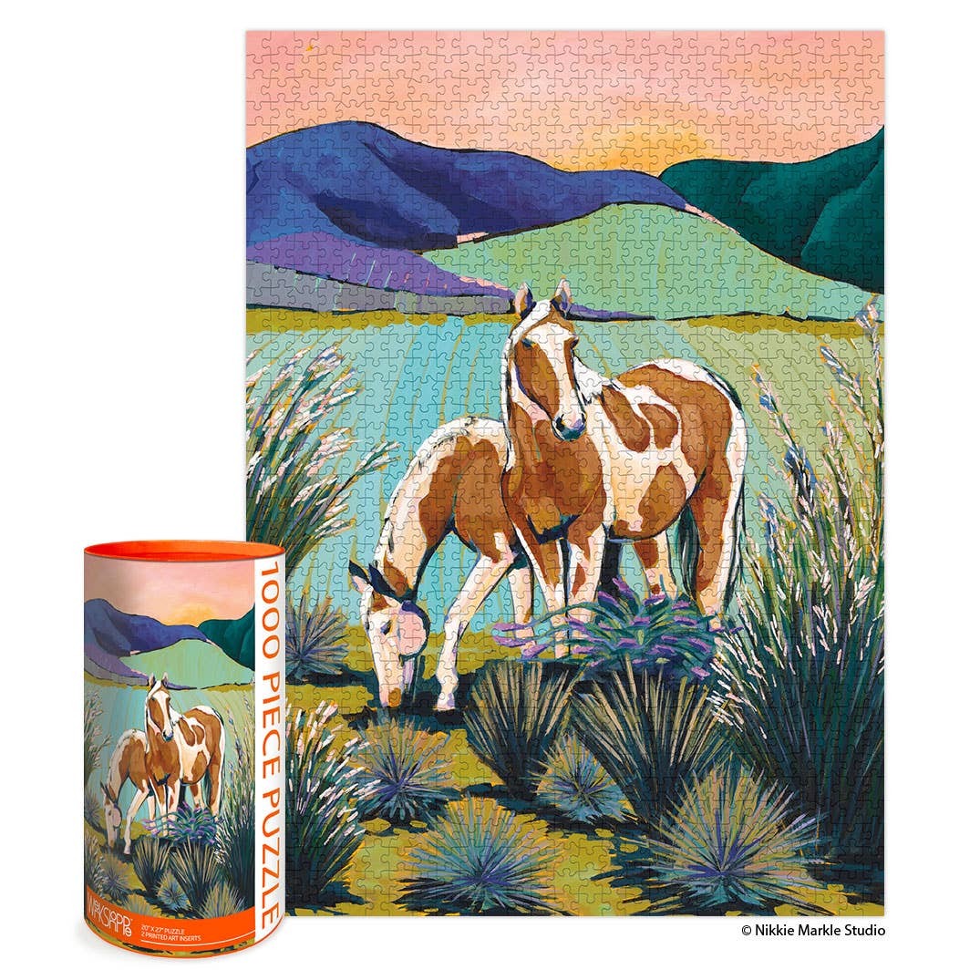 Puzzle with landscape of two horses, mountains and lake. Horses are grazing. 