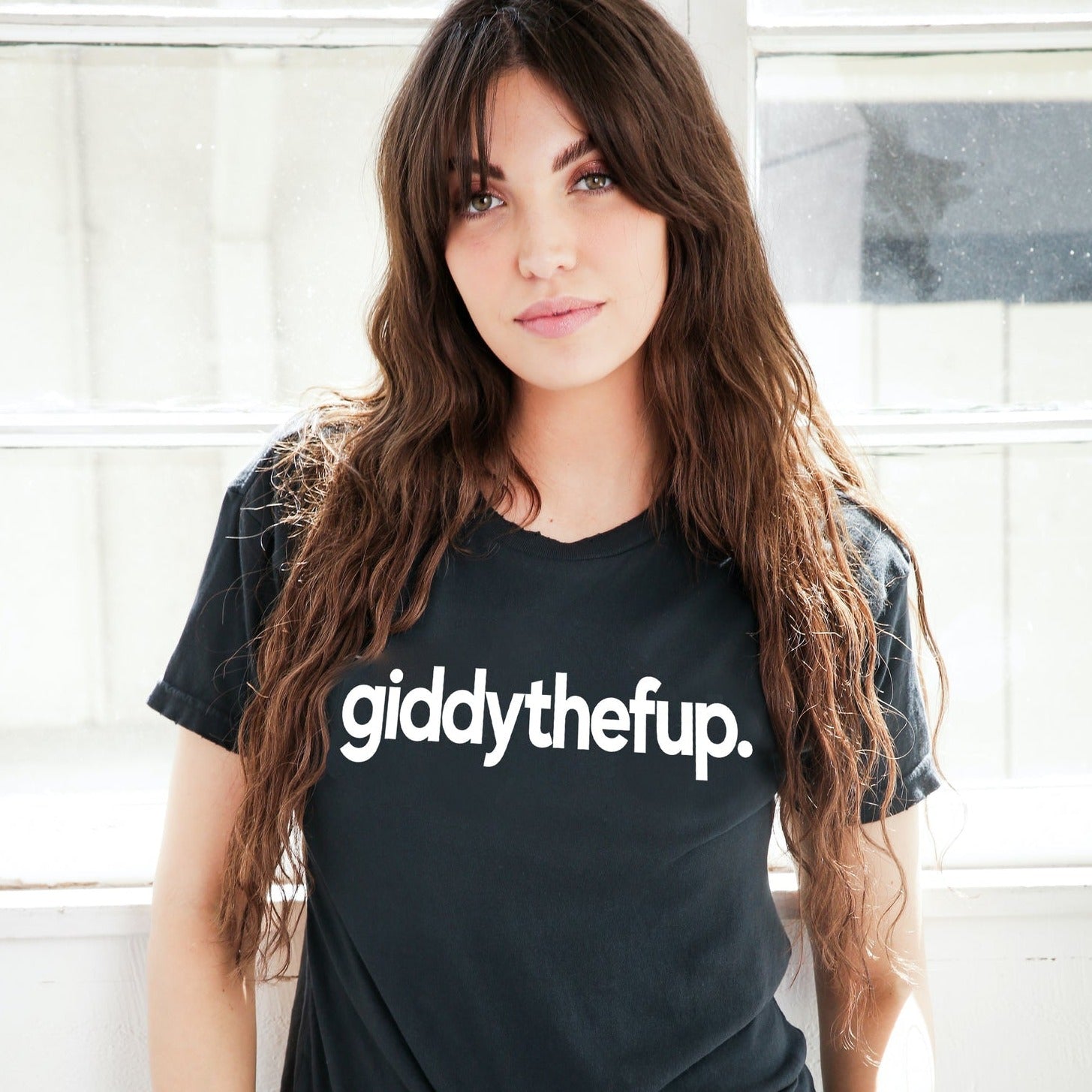 Black distressed short sleeve t shirt with white text "giddythefup"